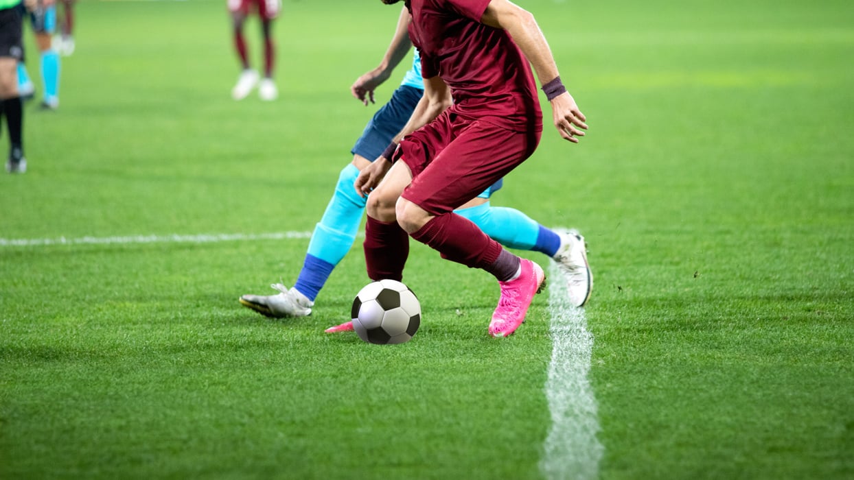 Football players on a pitch