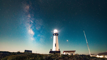 Lighthouse with starry sky