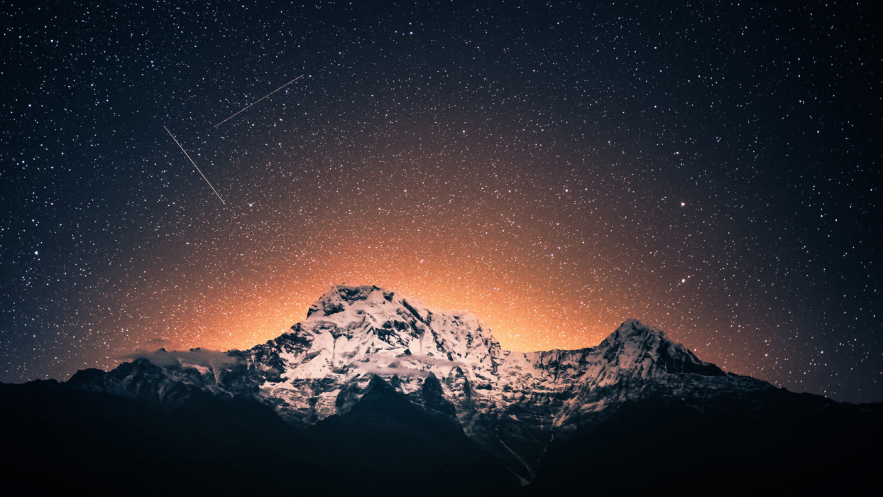 Mountain top in night sky