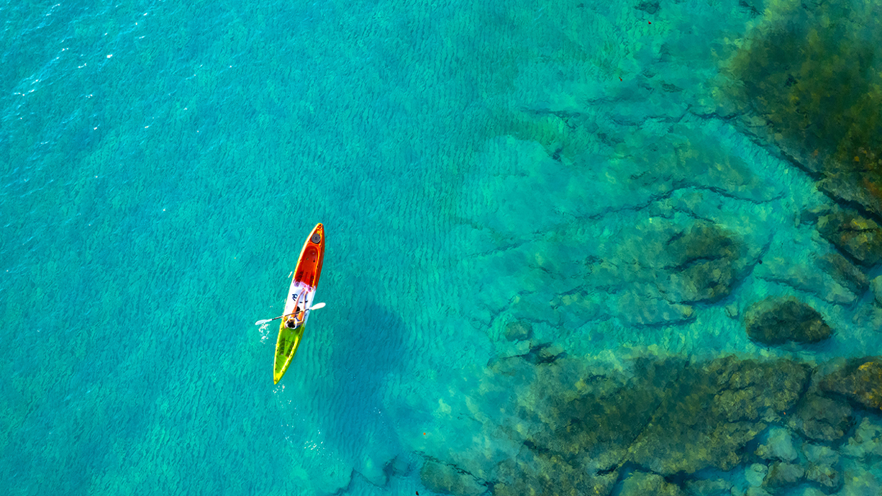 Canoe on turquoise water