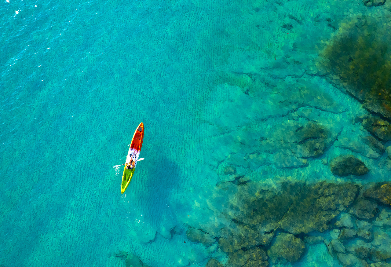 Canoe on turquoise water