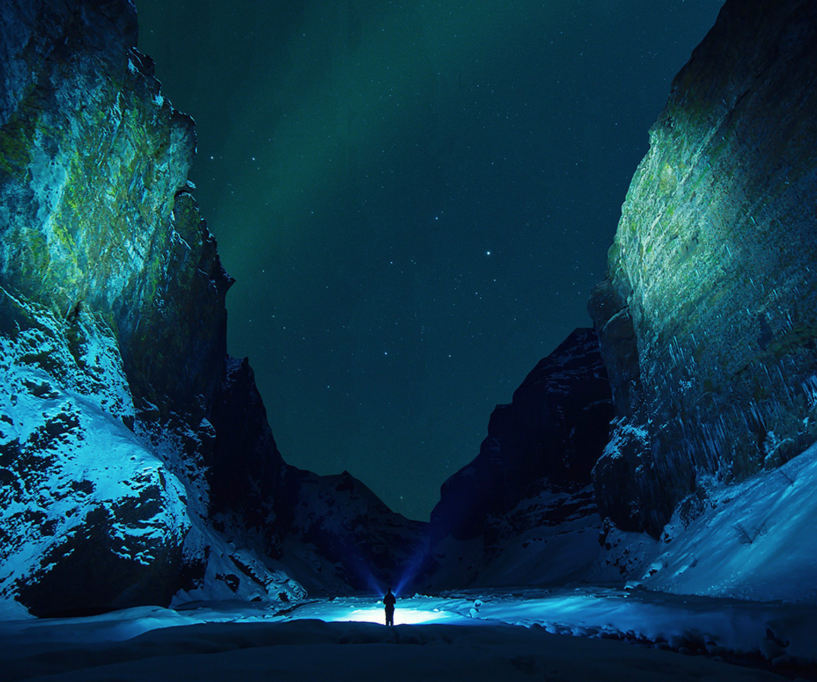 Person in a valley at night