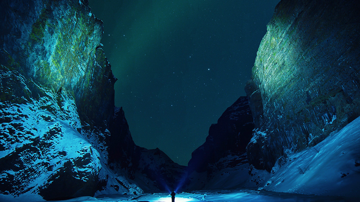 Person in a valley at night