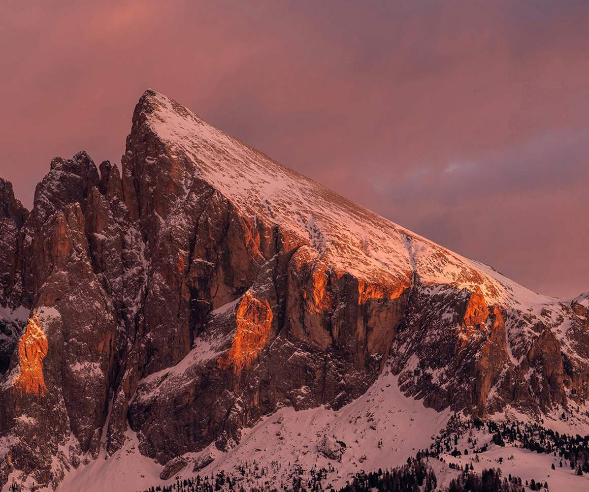 Mountain during pink sunset