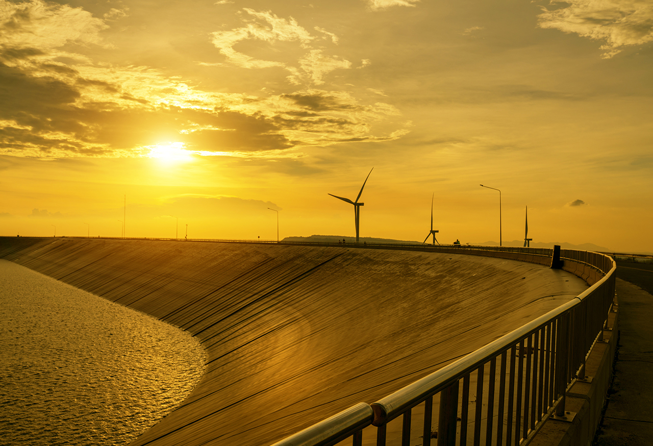 Wind turbines near a body of water