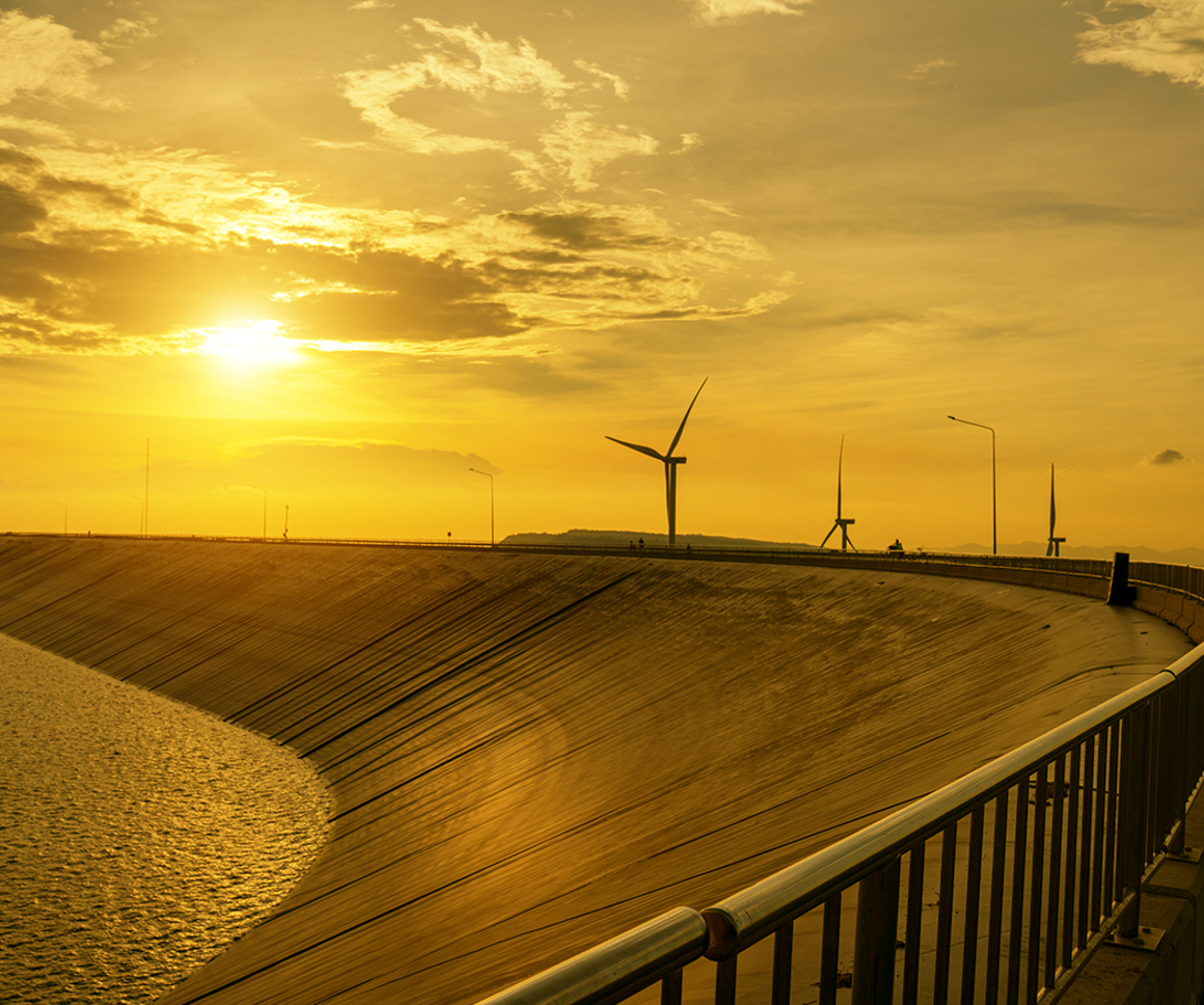 Wind turbines near a body of water