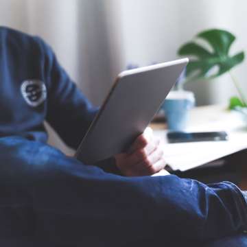 Man reading an ipad