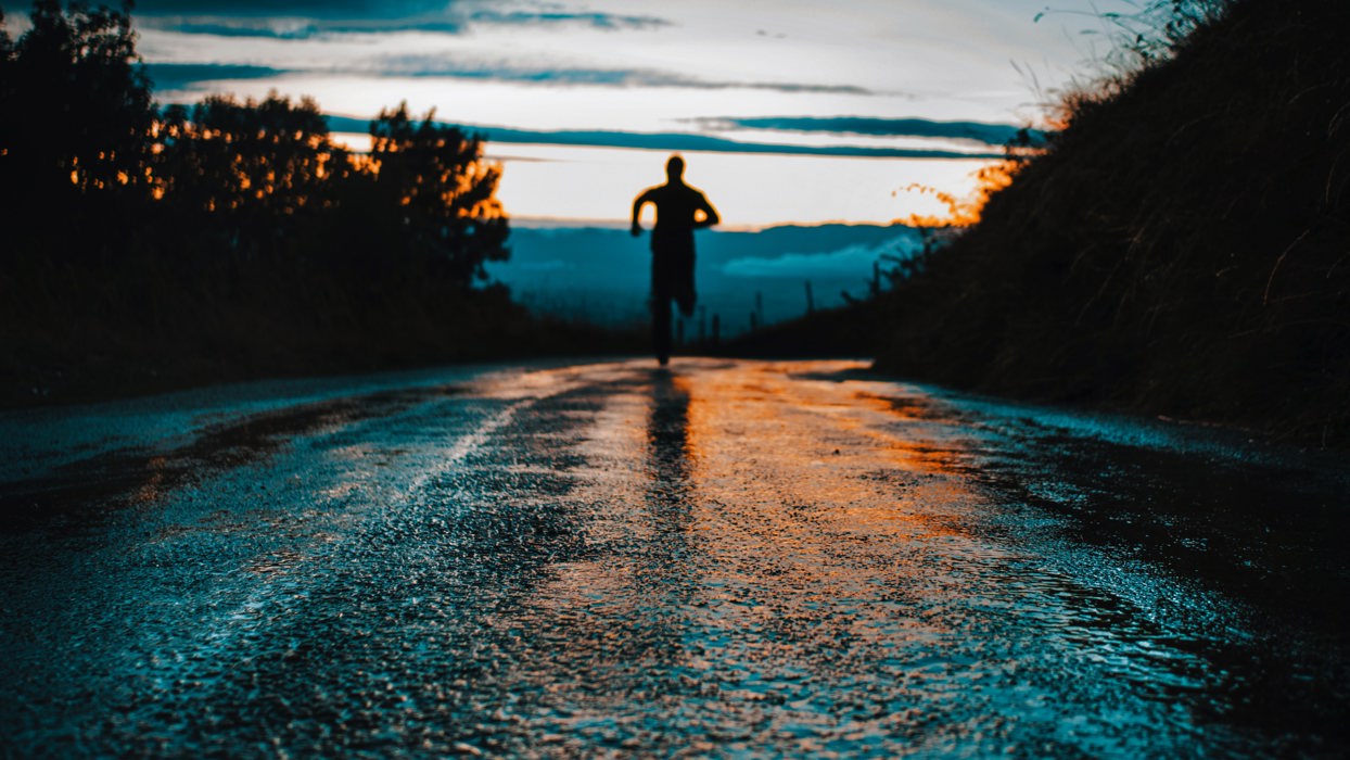 Person Running After A Downpour