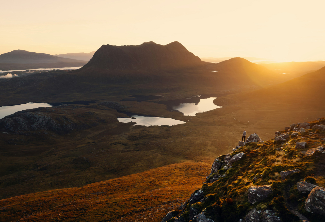 Sunset over rugged terrain