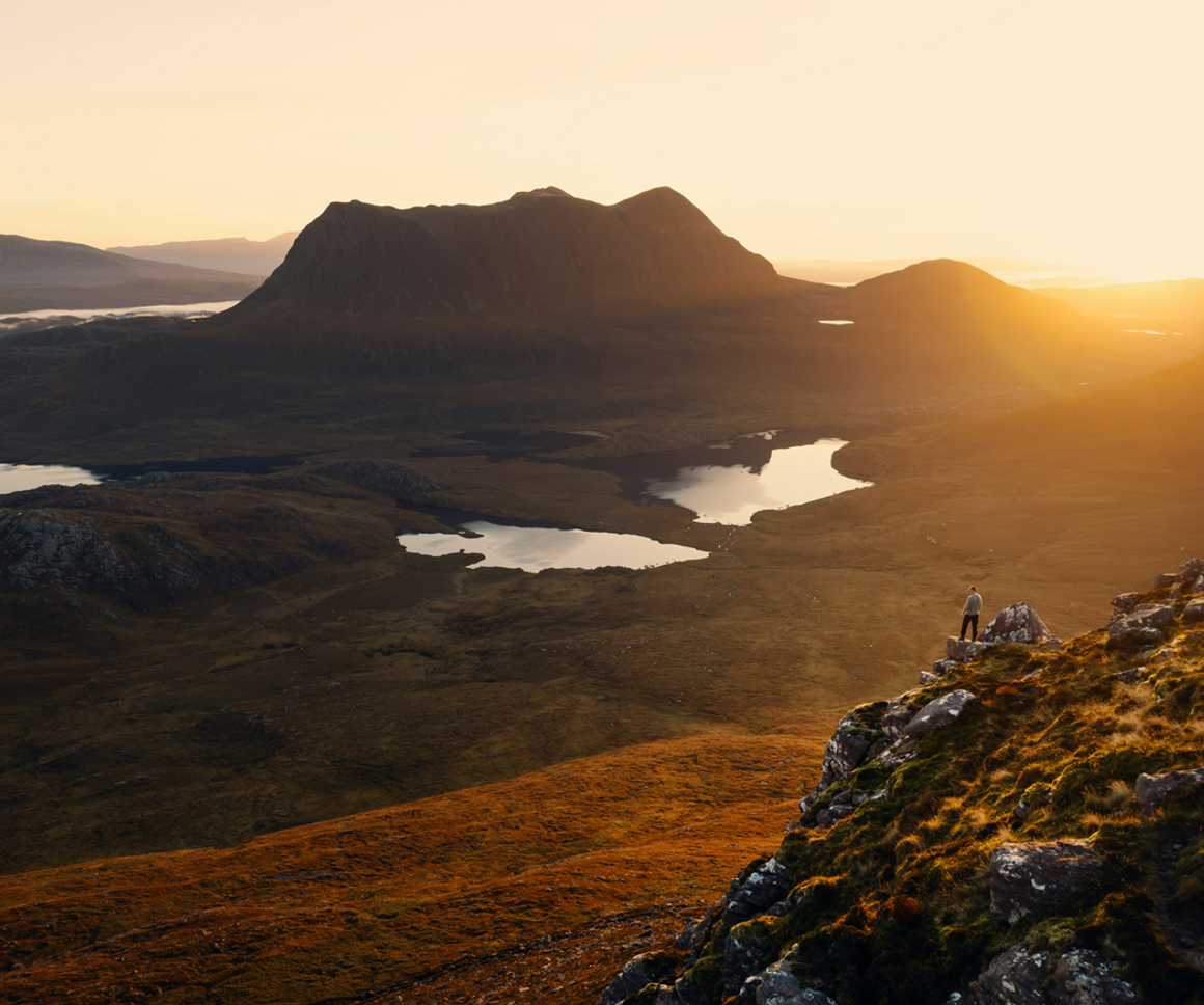 Sunset over rugged terrain