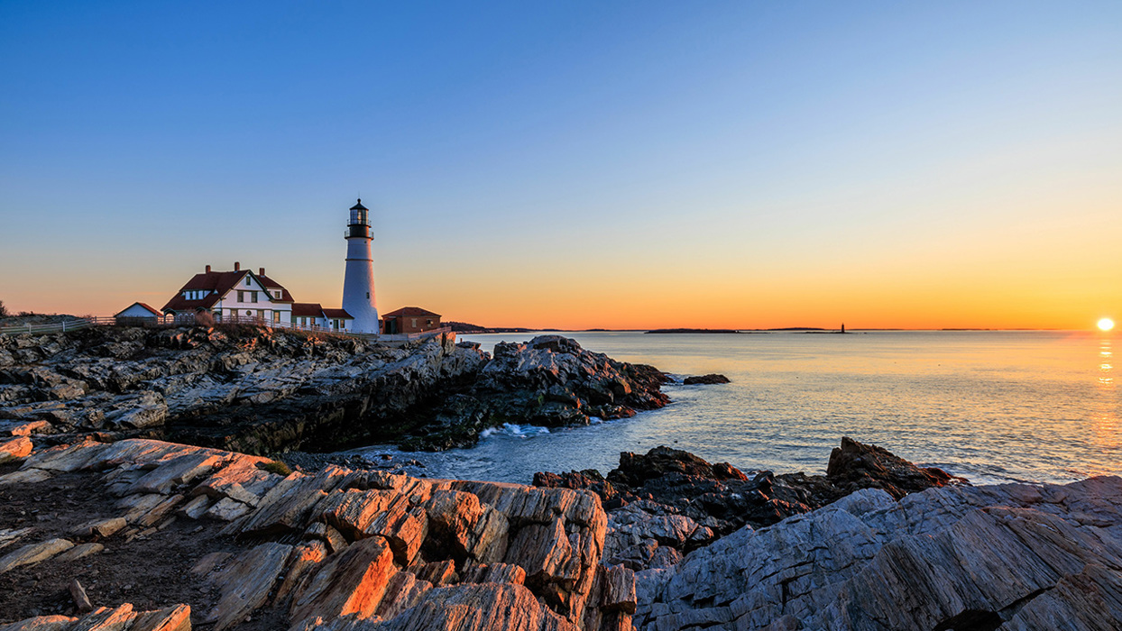 Lighthouse At Sunset