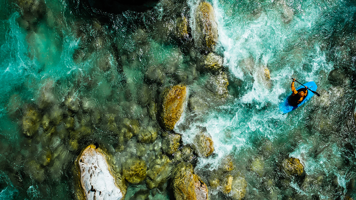 White water rapids with a kayaker